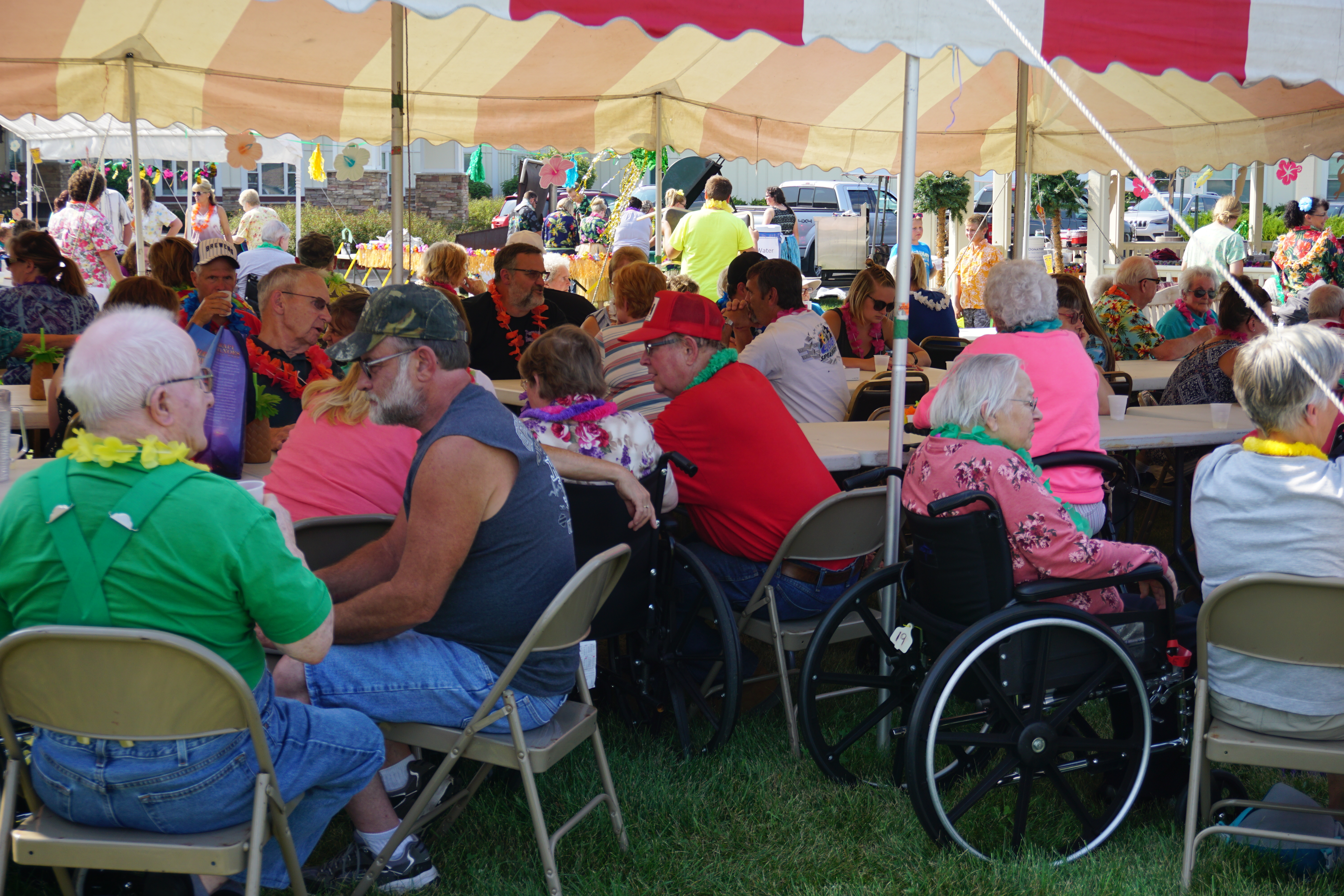 All under the tent during the Family Fun Carnival.