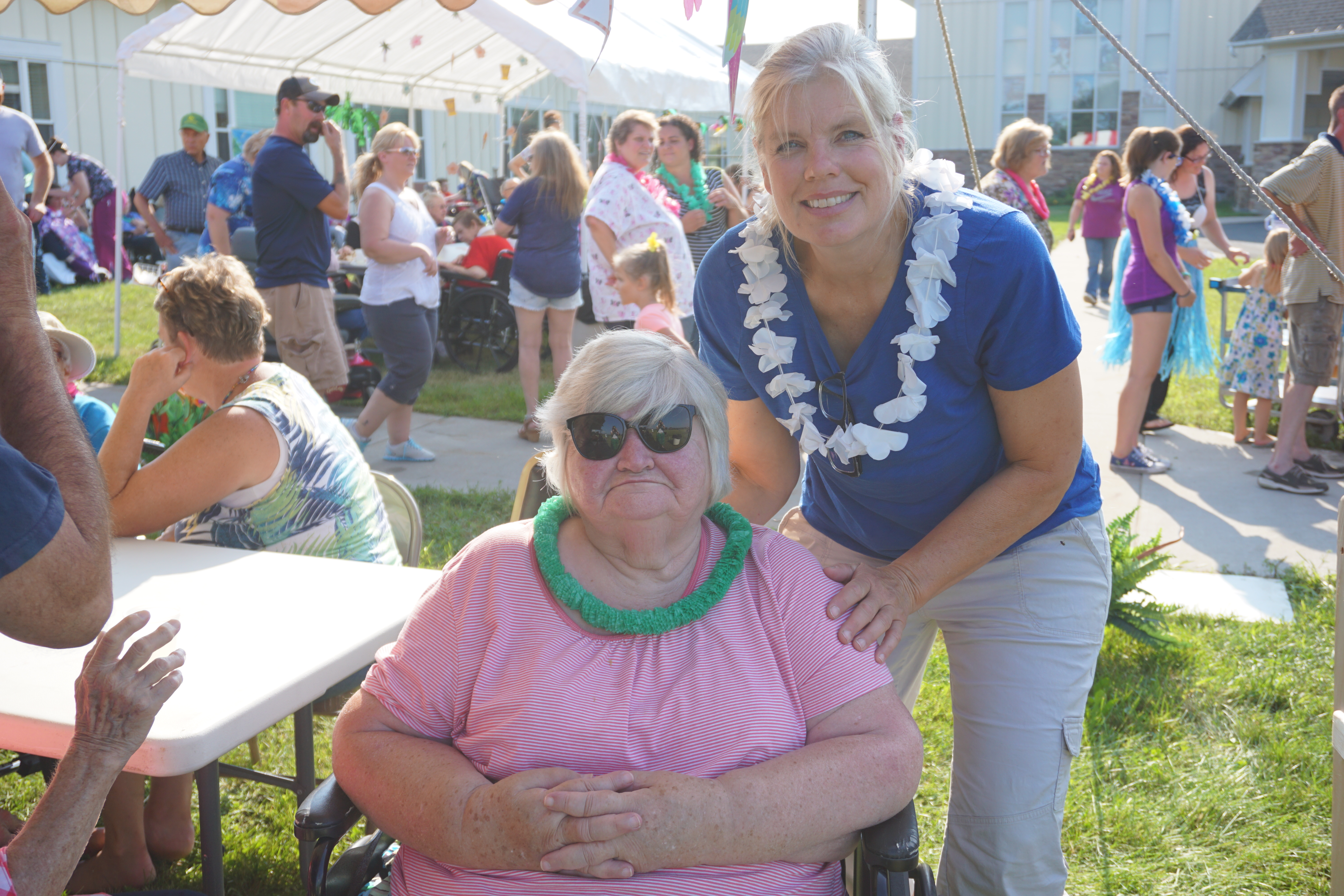 Resident and family enjoy Luau.