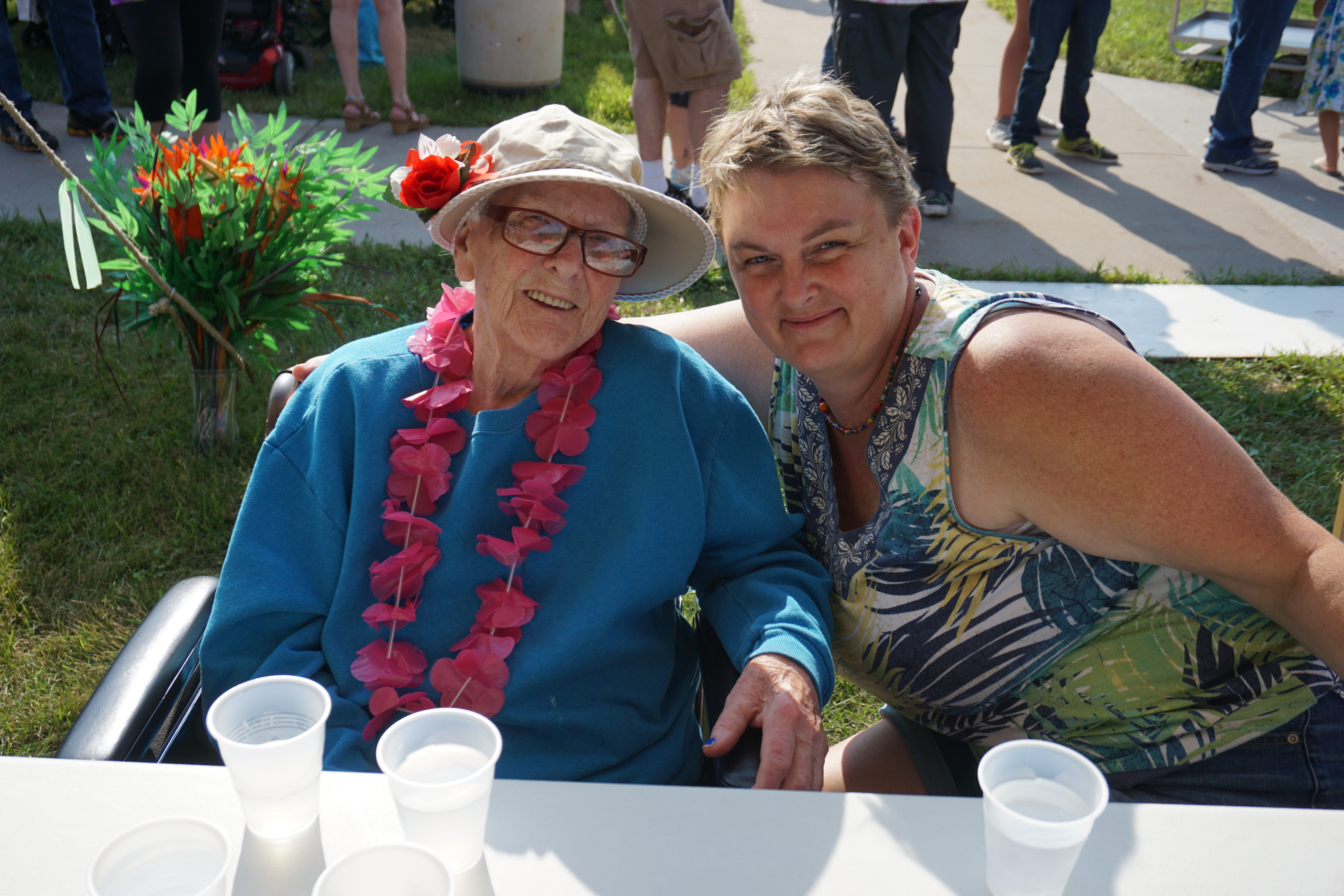 Resident and family enjoy Luau.