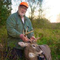 Guido holding his buck that he harvested from the accessible hunting blind at White Mound Count Park. 