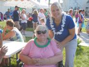 Resident and family enjoy Luau.