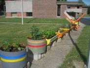 Container garden with multiple vegetable plants