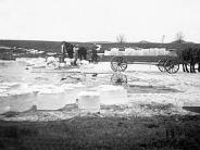 Denzer: Harvesting ice near Denzer during the early 1900's. Ice was stored in sheds, insulated with sawdust. During the summer m