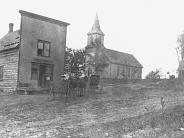 Loretto: This Irish community was located in Bear Creek Township. The general store and post office, left, served the needs of a