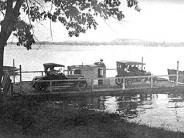 Merrimac: The Merrimac Ferry in 1916. Local boatman were ferrying passengers and teams across the river in the 1850's. Owners su