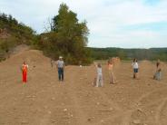 Volunteers are using hand seeding technique.