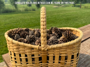 A picnic basket full of pinecones sits on a table with text reading to guess how many are in it