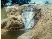 1960s, small waterfall flowing into a narrow stream