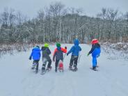 Five kids snowshoeing