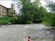 View of buildings on edge of Baraboo River