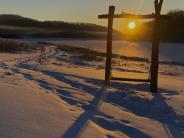 A photo bench located near the lake at White Mound County Park 