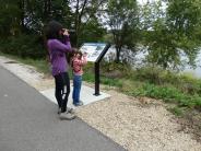 GSST visitors taking pictures and viewing the river