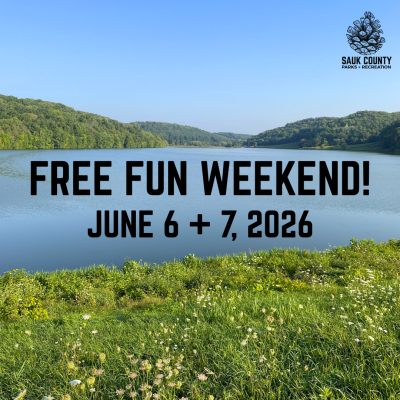 Free Fun Weekend on June 6 and 7, photo of White Mound Lake with grass and flowers in front