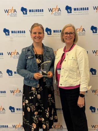 Rebecca Szydlowski (left) and Jessie Phalen (right) at the Wisconsin Public Health Association Conference. Rebecca Szydlowski (left) and Jessie Phalen (right) at the Wisconsin Public Health Association Conference.