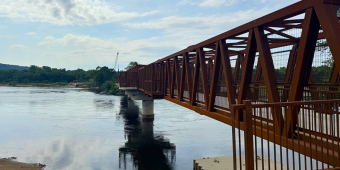 Wisconsin River with a large truss bridge crossing it on the right hand side, for a Great Sauk State Trail update