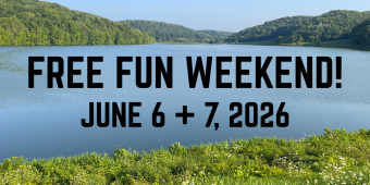 2026 Free Fun Weekend! Free Fun Weekend on June 6 and 7, photo of White Mound Lake with grass and flowers in front