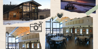 A large wooden building with an event room filled with tables and chairs faces a winter sunset over a snowy landscape